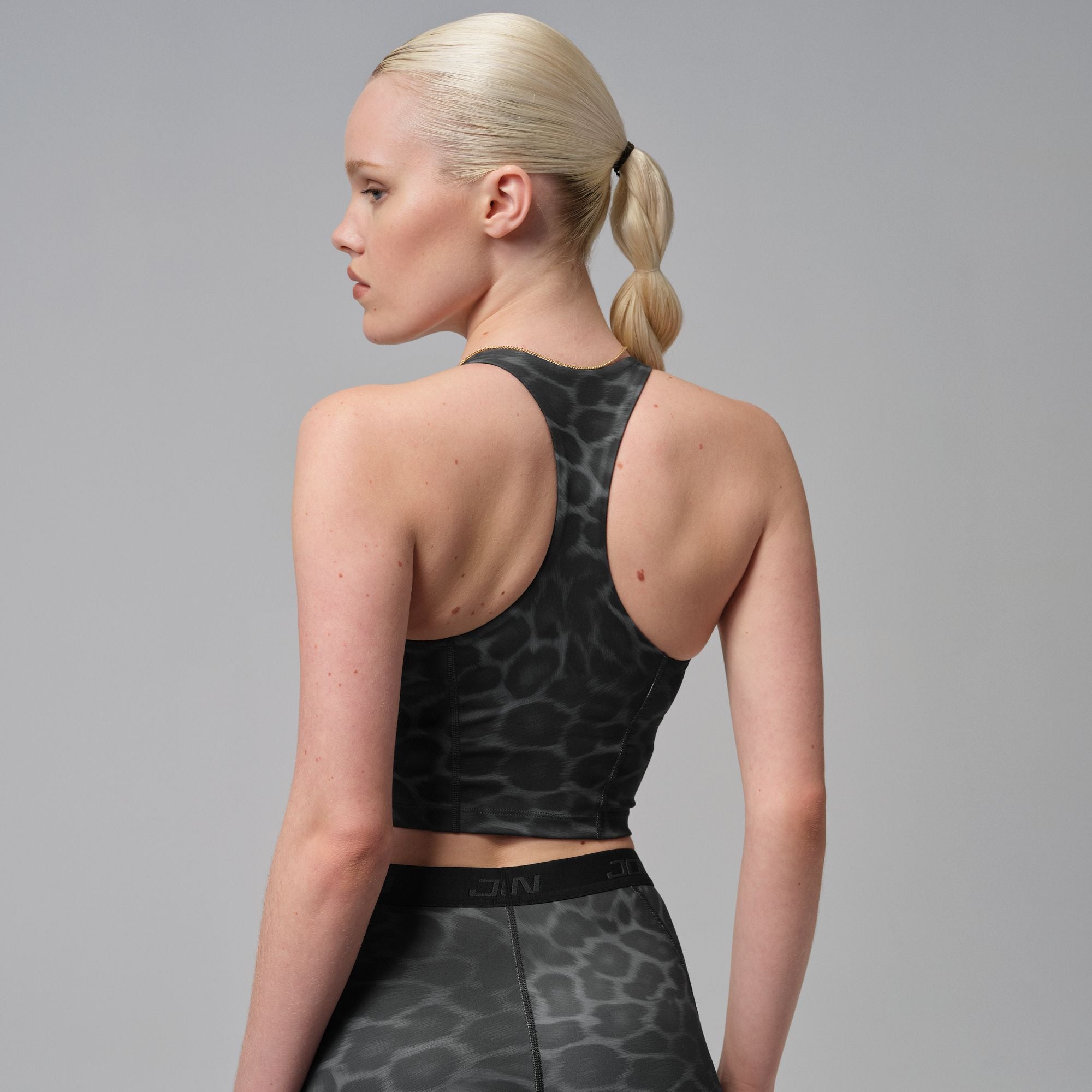 JORDAN SPORT טופ אימון מודפס